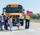 Thumbnail of kids crossing the road at a cross walk